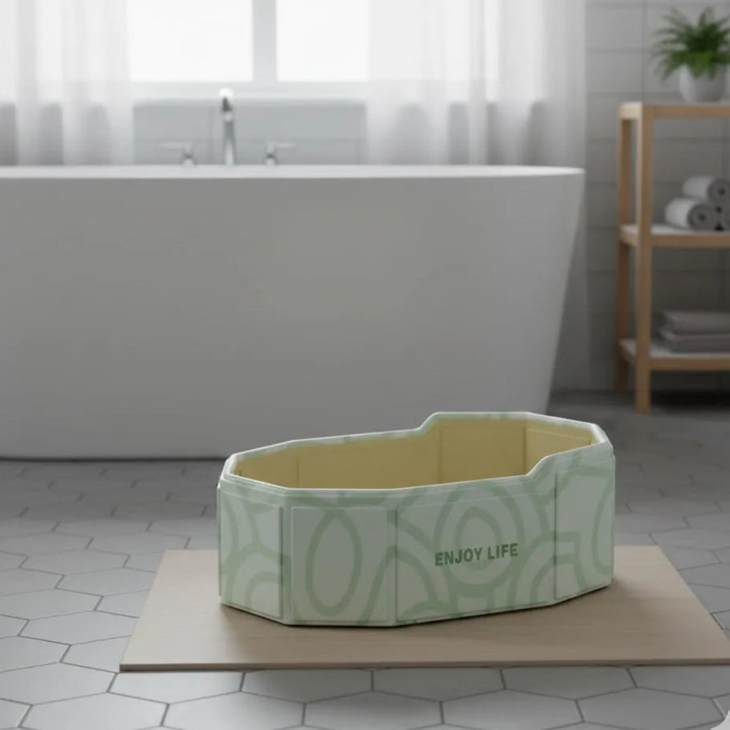 Grande baignoire pliable pour bébé au design naturel vert menthe, adaptée aux bébés et aux tout-petits.