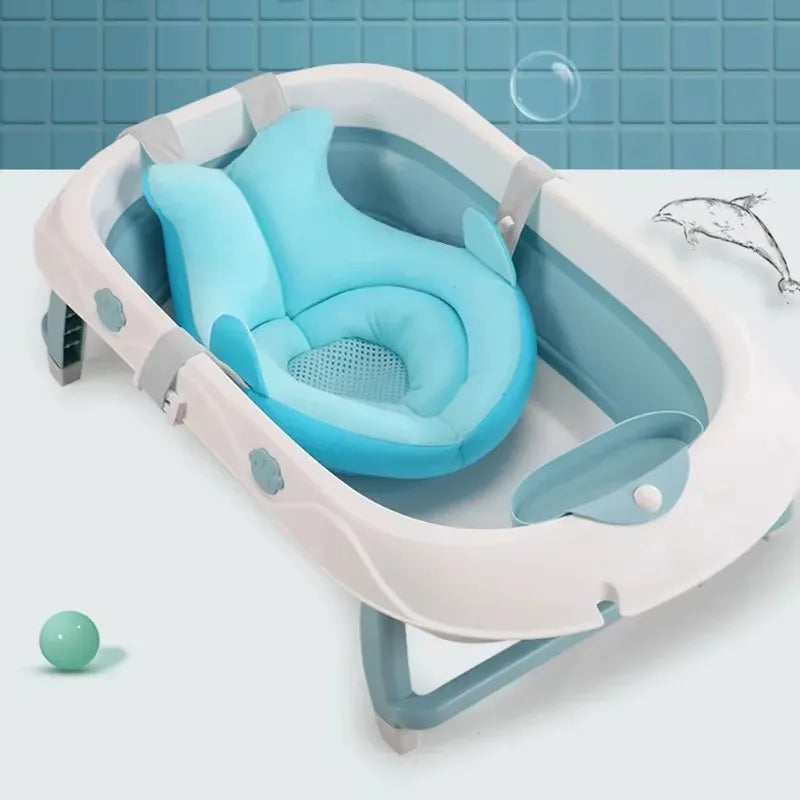 Coussin baignoire bébé enveloppant Cocon bain bleu dans une baignoire pliable bebe