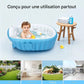 Baignoire pour bébé gonflable et portable de couleur bleue avec bébé à l'intérieur.