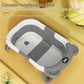 Vue latérale d’une baignoire bébé pliable montrant la profondeur du bain