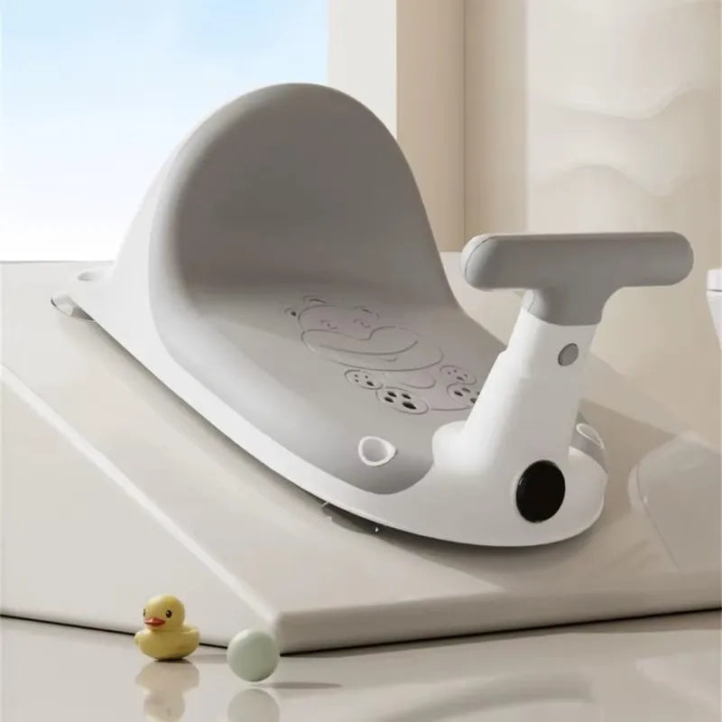 Couleur gris, siège baignoire bébé enveloppant.