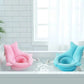 Coussin de baignoire pour bébé en forme de cocon pour prendre un bain dans une baignoire standard.