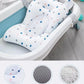 Détail du tissu doux et respirant du coussin de baignoire bébé ourson ergonomique