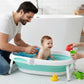Coussin de baignoire bébé enveloppant cocon de bain utilisé dans une baignoire avec bébé