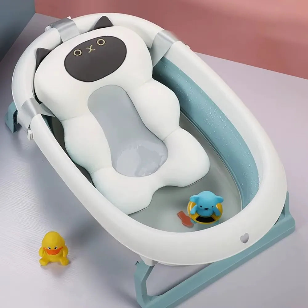 Coussin de bain pour bébé forme chat blanc.