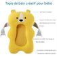 Coussin de bain pour bébé avec sangles de sécurité et détails.