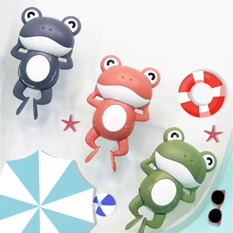 Jouets de baignoire pour bébé, en forme de grenouille, de différentes couleurs.