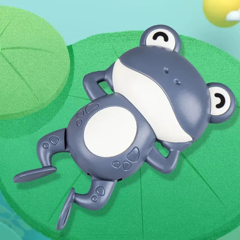 Jouet pour bébé grenouille mécanique bleu.