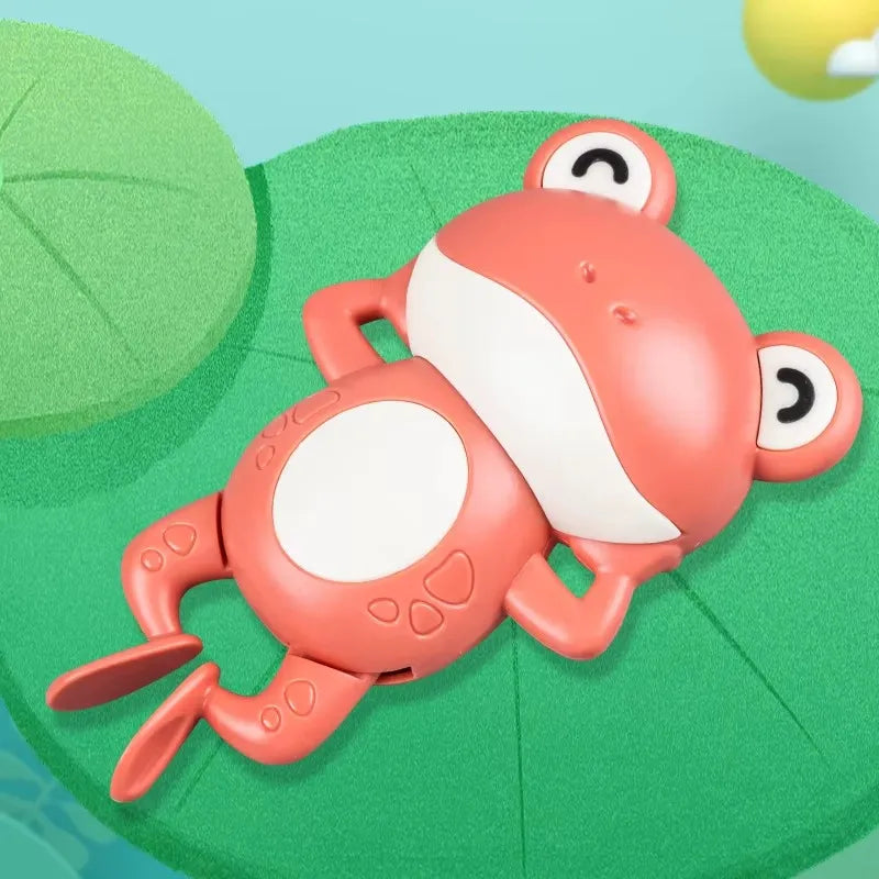 Jouet pour bébé grenouille mécanique rouge.