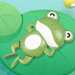 Jouet pour bébé grenouille mécanique verte.