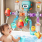 baignoire-05.jpgBébé souriant dans baignoire avec jouet robot tuyaux modulables fixé au mur