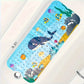 Tapis de bain pour bébé à motifs marins, variante dauphin marin, pour poser dans la baignoire.