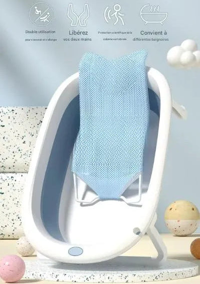 Transat-baignoire pour bébé avec filet et support rigide en vue d'angle.