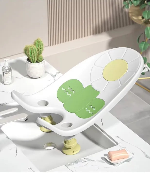 Transat de bain pour bébé, installation sécurisée, couleur blanche.