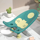 Transat de bain pour bébé avec installation sécurisée et couleur verte.